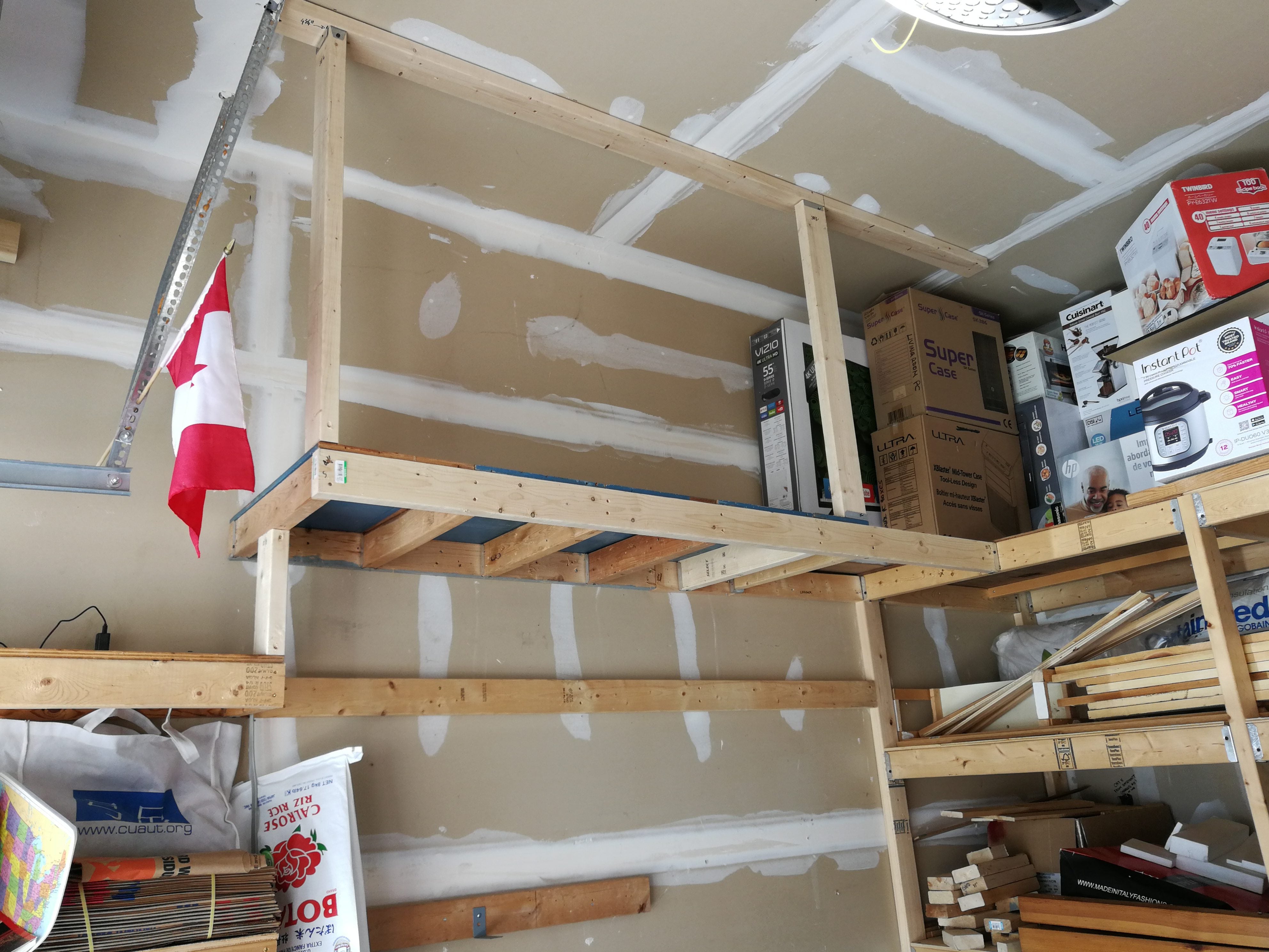 Hanging A Storage Rack On An Engineered, Hanging Shelves From Ceiling Joists