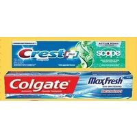 Oral-B Cavity Defense Manual Toothbrush, Crest Complete + Scope or Colgate Maxfresh Toothpaste