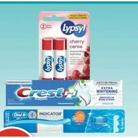 Lypsyl Lip Balm, Oral-B Indicator Manual Toothbrush or Crest 3dwhite Toothpaste 
